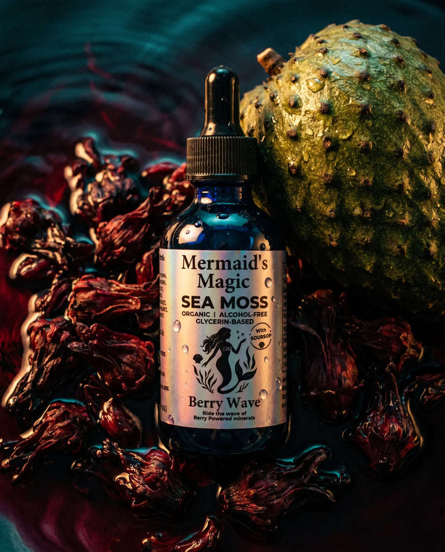 Berry Wave Sea Moss + Soursop Tincture with Hibiscus styled with fresh botanicals and tropical fruit