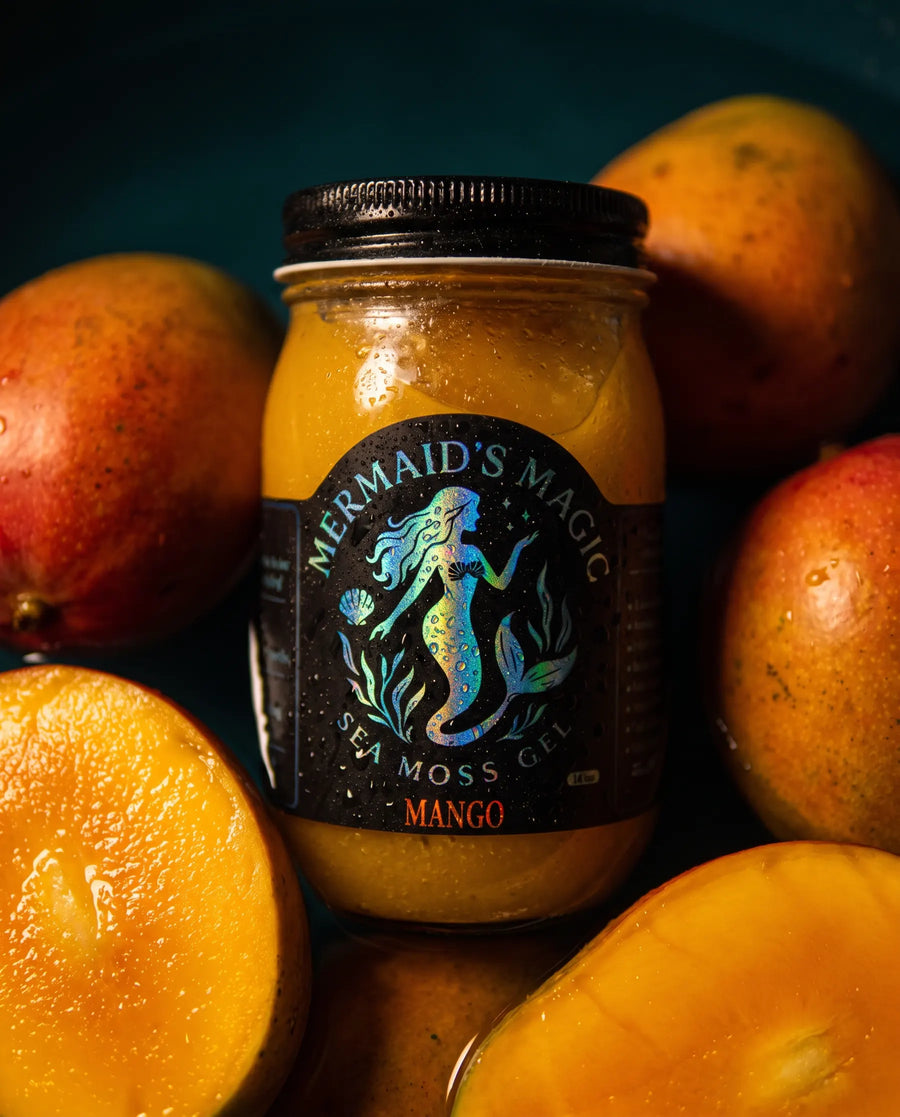 Mango Flavor Sea Moss Gel styled with fresh whole fruit