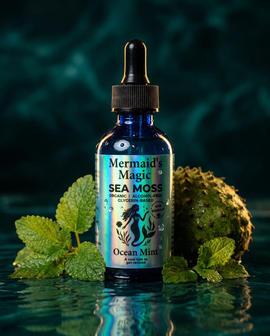 Ocean Mint Sea Moss + Soursop Tincture with Lemon Balm styled with fresh botanicals and tropical fruit